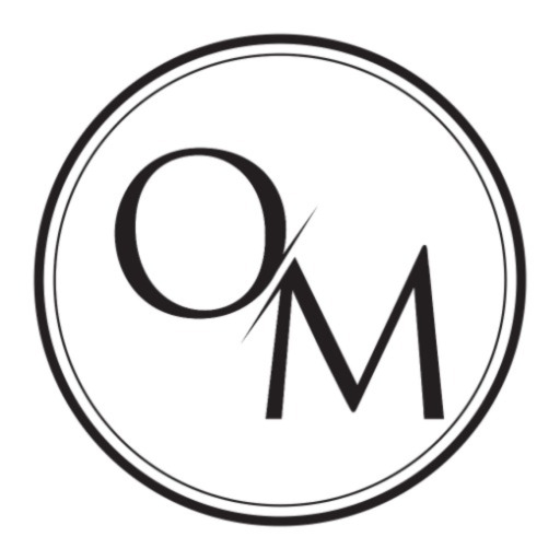 OM Wellness logo
