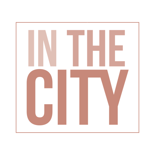 In The City App logo