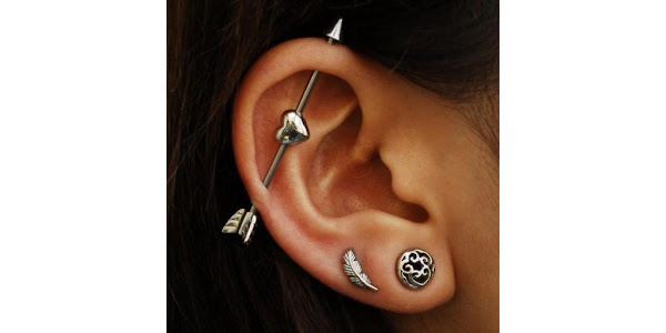 Bar through top of ear deals piercing